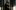 The Matrix film image; man and woman stand in elevator shaft