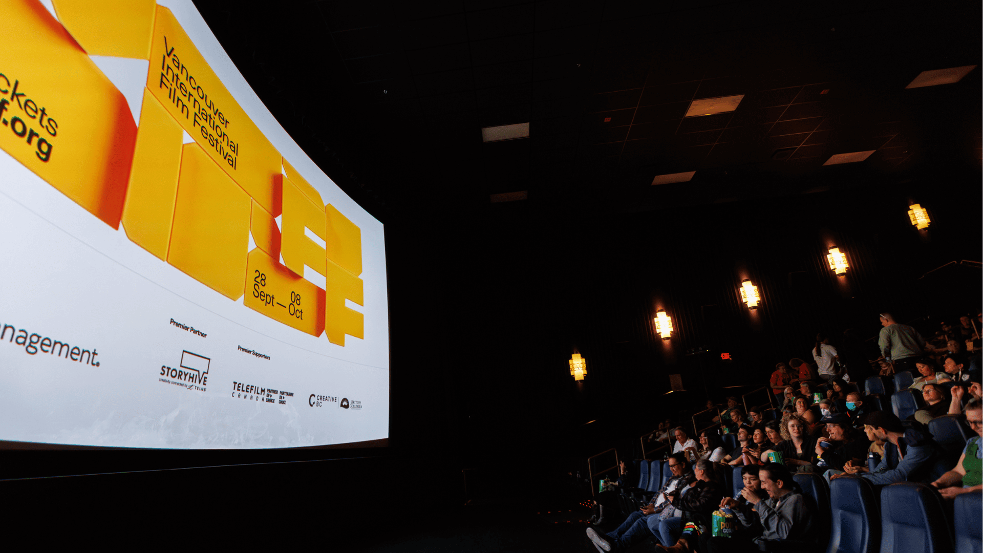 VIFF logo on screen in theatre with audience