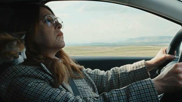 Hear the Yellow film image; woman driving a car