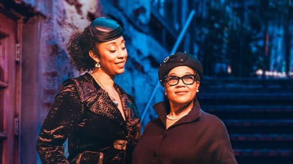 two women on a stage