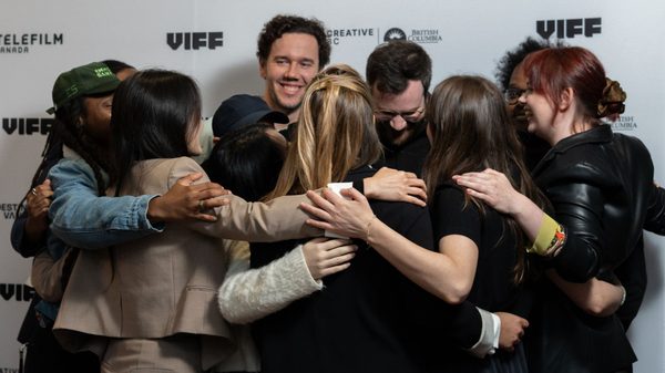 people in a group hug