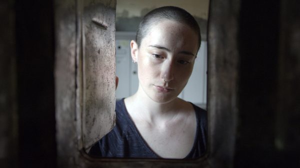 perspective from inside a locker as someone opens it