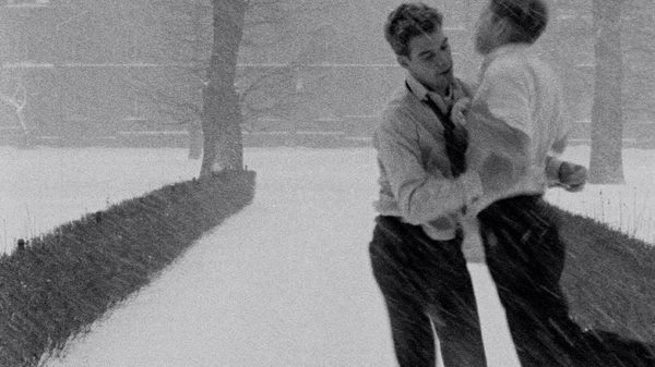 Winter Kept Us Warm film image; two men in the snow