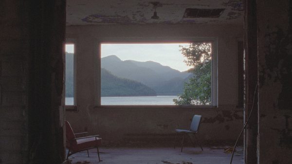 Ocean Falls film image; view looking out a window at mountains
