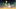 Another World film image; two cartoon characters standing in a grassy field at night