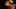 Chungking Express film image; person next to a red booth