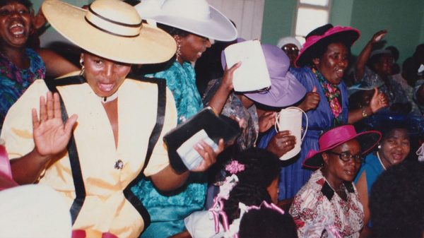 Milisuthando film image; a group of people in nice outfits