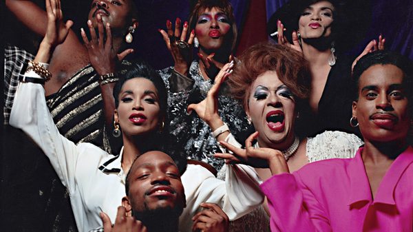 Paris is Burning film image; people in a crowd gesticulating
