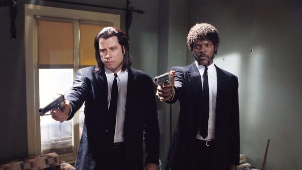Pulp Fiction film image; two men in suits holding up handguns