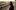 Glory film image; man standing by train tracks
