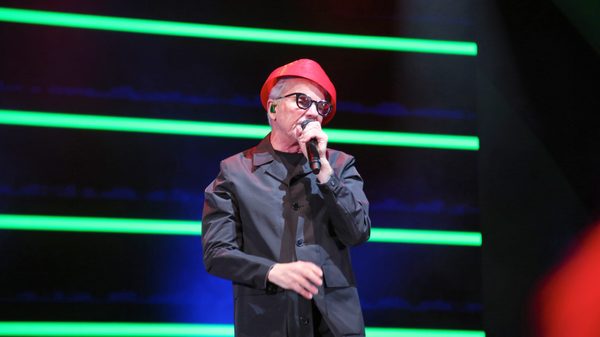 man singing into a microphone
