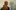 Ceremony film image; person in traditional Indigenous clothing