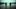 Closure film image; two people walking through water