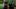 The Day of the Beast film image; two people standing in a green-painted room