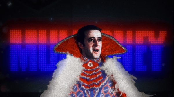 Ladies and Gentlemen, Brian Mulroney film image; man wearing an extravagant cape