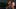 Naomi Osaka: The Second Set film image; woman smiling at an audience