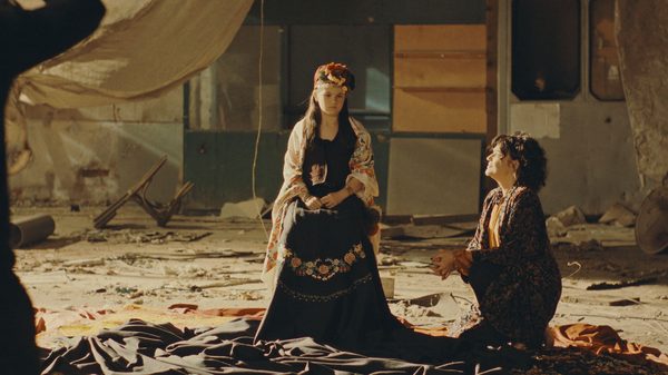 Nina Roza film image; two women performing on a stage