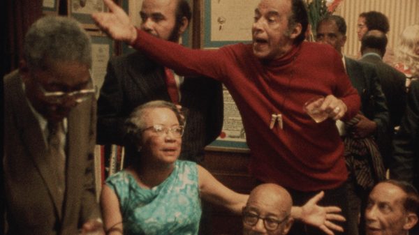 Once Upon a Time in Harlem film image; group of people gesturing at each other