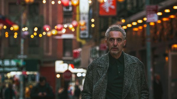 The Only Living Pickpocket in New York film image; man walking down a city street
