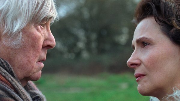 Queen at Sea film image; two people staring at one another