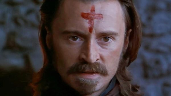 Ravenous film image; man with a red cross painted on his forehead