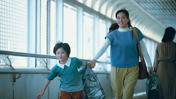 Sheep in the Box film image; young kid dragging their mother by the hand
