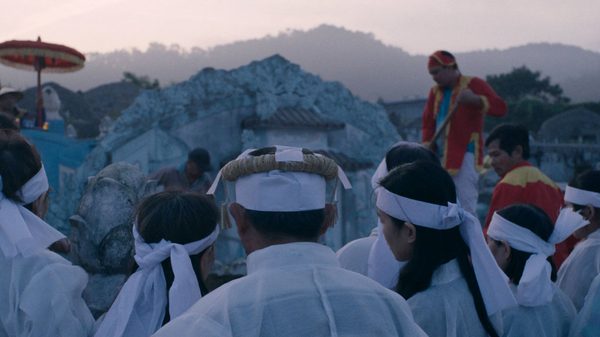 Still Night, Burning House film image; group gathered outside