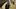 The Secrets in Their Eyes film image; two people talking in a crowded train station