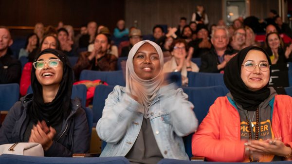 audience members applauding