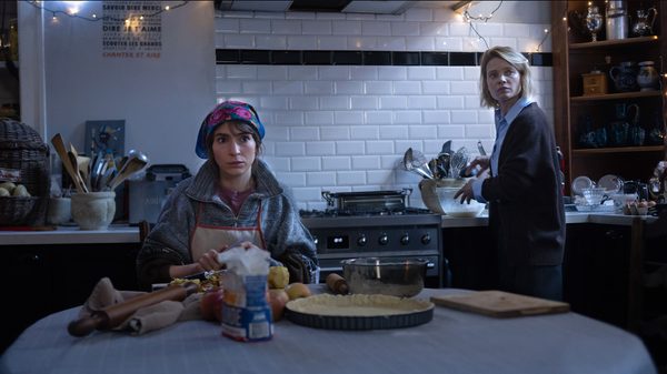 The Diary of a Chambermaid headshot; two people looking serious in a kitchen