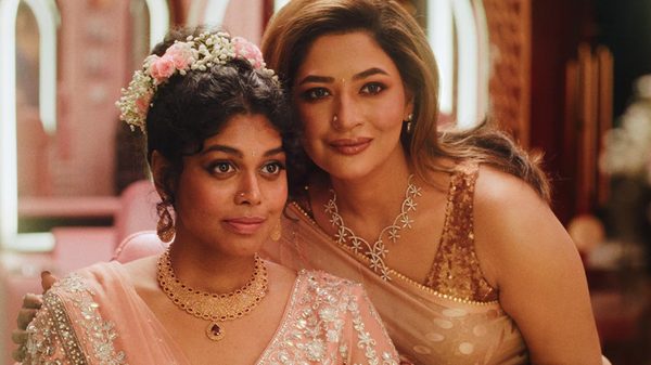 The Difficult Bride film image; two women dressed in saris