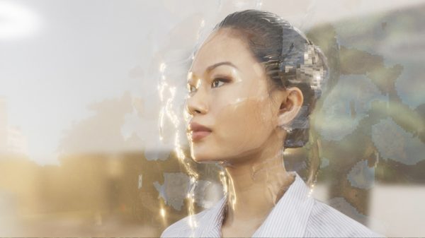 Display Nature film image; woman with a weird plastic-y affect in the air around her head