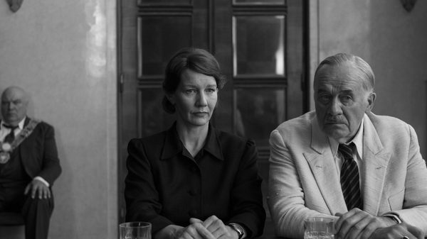 Fatherland film image; man an woman sitting together