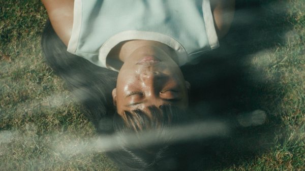 Filipinana film image; girl eyes closed upside down
