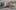 The History of Concrete film image; cement truck blocking a road