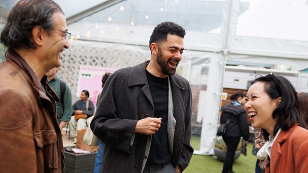people laughing at a party