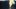 Jack Johnson: Surfilmusic film image; surfer cresting a huge wave