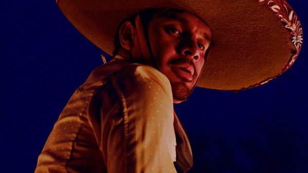 Jaripeo film image; man looking over his shoulder