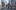 Light Pillar film image; animated people carrying a long red banner