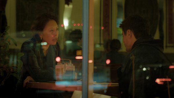 A Lonely Night film image; two people sitting in a restaurant