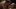 Nobody's Violence film image; person examining another person's mouth