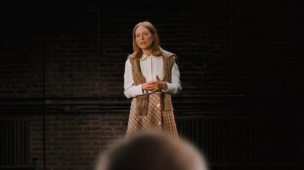 The Debut film image; woman speaking to an unseen audience