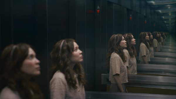 Pocket Mirror film image; girl's reflection repeating into infinity