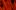 Vulnus film image; overlaid faces under red light