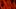Vulnus film image; overlaid faces under red light