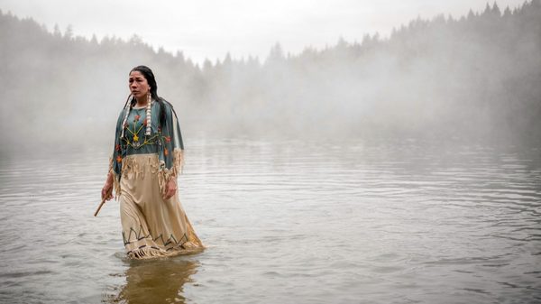 Reclaim My Skin film image woman walking through misty water