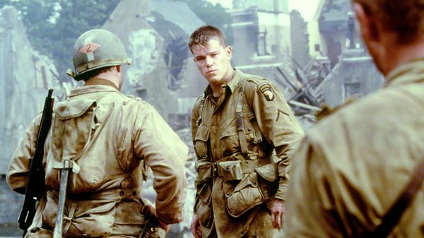 Saving Private Ryan film image; three soldiers on a battlefield