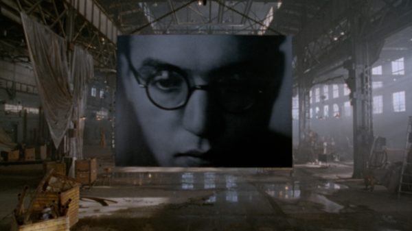 September Song film image; projector in warehouse