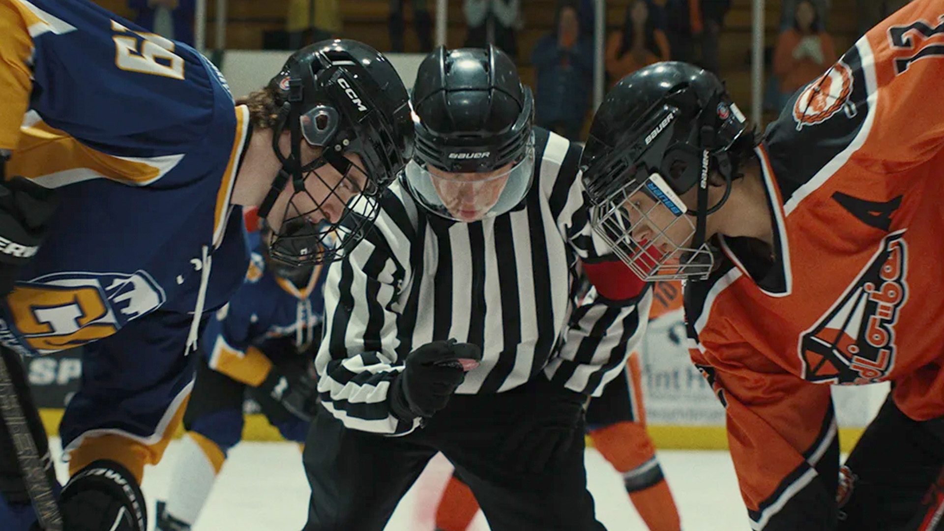 Smudge the Blades headshot; hockey players in a faceoff