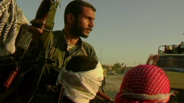 The Story of Documentary Film film image; man in a war zone